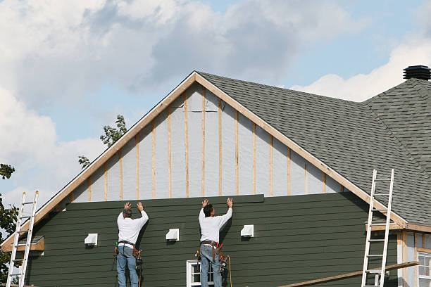 Professional Siding technician working in Guys Mills, PA